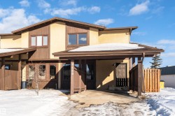 View of front of property with stucco siding - 