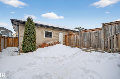 Snow covered property featuring a fenced backyard - 5256 21 Avenue, Edmonton, AB - Outdoor