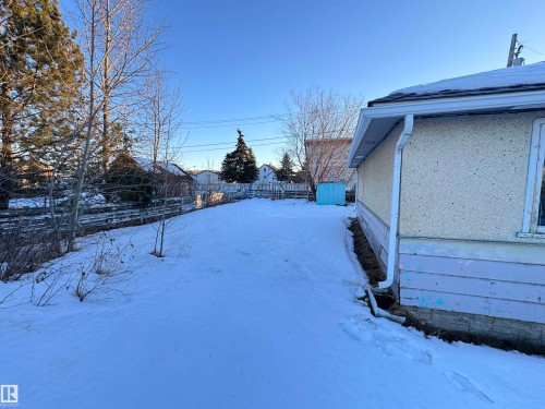View of snowy yard - 10407 102 Street, Westlock, AB - Outdoor