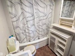 Full bath with shower / bath combo with shower curtain and toilet - 