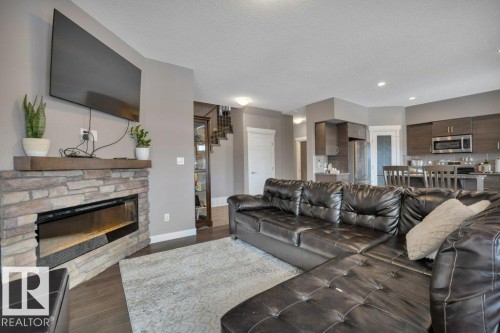 45 Sandalwood Place, Leduc, AB - Indoor Photo Showing Living Room With Fireplace