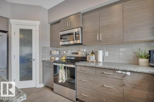 45 Sandalwood Place, Leduc, AB - Indoor Photo Showing Kitchen With Stainless Steel Kitchen With Upgraded Kitchen