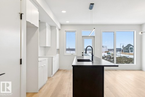 7471 Klapstein Crescent, Edmonton, AB - Indoor Photo Showing Kitchen With Double Sink
