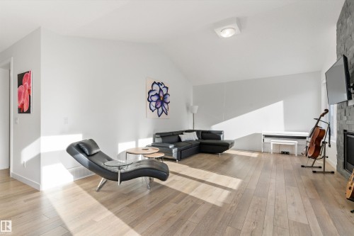 20007 16 Avenue, Edmonton, AB - Indoor Photo Showing Living Room With Fireplace