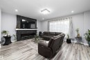 4223 Veterans Way, Edmonton, AB  - Indoor Photo Showing Living Room With Fireplace 