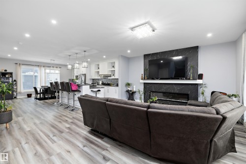 4223 Veterans Way, Edmonton, AB - Indoor Photo Showing Living Room With Fireplace