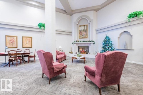 111 10935 21 Avenue, Edmonton, AB - Indoor With Fireplace