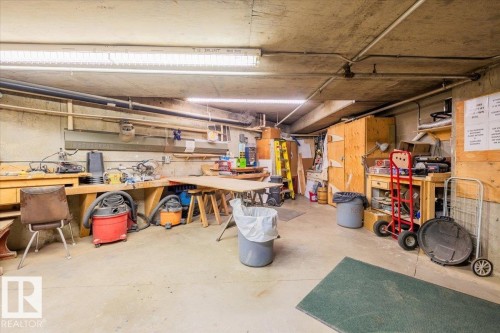 111 10935 21 Avenue, Edmonton, AB - Indoor Photo Showing Garage