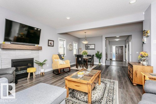 49 Wilson Close, Fort Saskatchewan, AB - Indoor Photo Showing Living Room With Fireplace