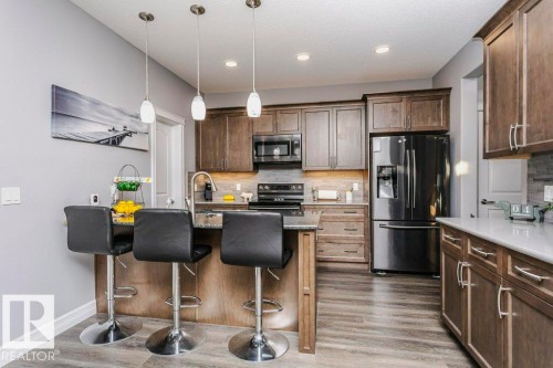 49 Wilson Close, Fort Saskatchewan, AB - Indoor Photo Showing Kitchen With Upgraded Kitchen