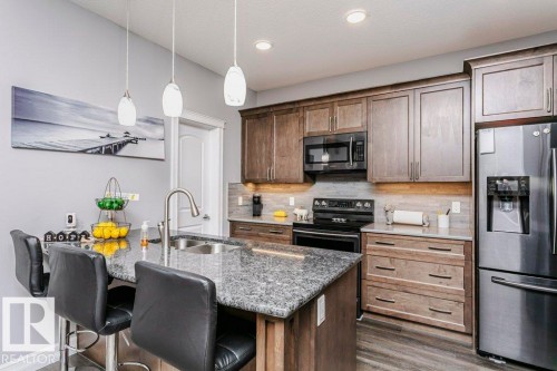 49 Wilson Close, Fort Saskatchewan, AB - Indoor Photo Showing Kitchen With Double Sink