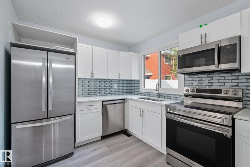 13251 47 Street, Edmonton, AB - Indoor Photo Showing Kitchen With Stainless Steel Kitchen With Double Sink