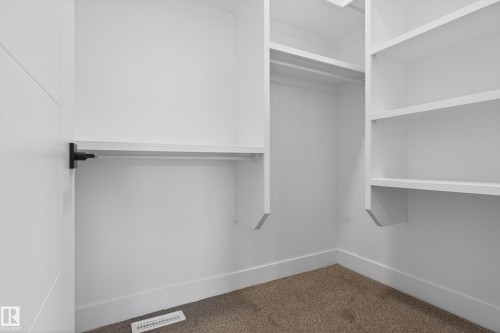 Walk in closet with carpet - 26 Rosa Crescent, St. Albert, AB - Indoor With Storage