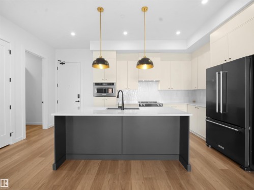 402 7459 May Common, Edmonton, AB - Indoor Photo Showing Kitchen With Upgraded Kitchen
