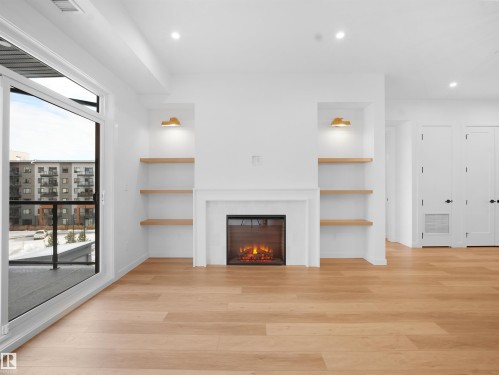 402 7459 May Common, Edmonton, AB - Indoor With Fireplace