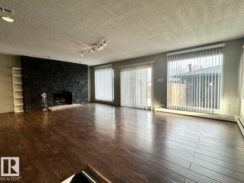 12409 80 Street, Edmonton, AB - Indoor Photo Showing Living Room With Fireplace