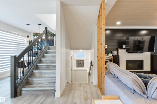 219 37 Street, Edmonton, AB - Indoor Photo Showing Other Room With Fireplace