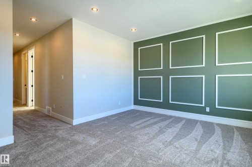 Carpeted empty room featuring baseboards and recessed lighting - 16 Middleton Close, Leduc, AB - Indoor Photo Showing Other Room