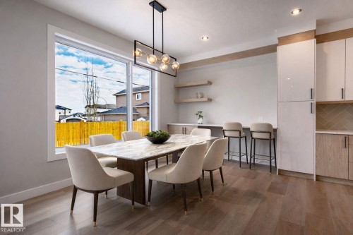 Dining space with light wood-type flooring and recessed lighting - 16 Middleton Close, Leduc, AB - Indoor Photo Showing Dining Room