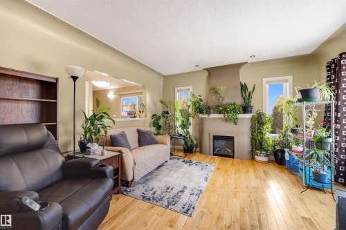 11822 125 Street, Edmonton, AB - Indoor Photo Showing Living Room With Fireplace