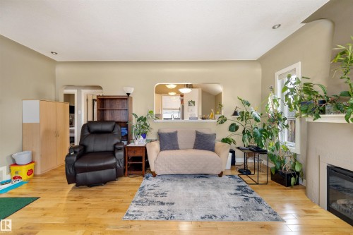 11822 125 Street, Edmonton, AB - Indoor Photo Showing Living Room With Fireplace