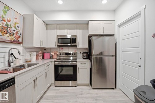 4319 Cooke Lane, Edmonton, AB - Indoor Photo Showing Kitchen With Double Sink