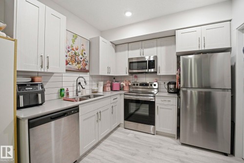 4319 Cooke Lane, Edmonton, AB - Indoor Photo Showing Kitchen With Double Sink