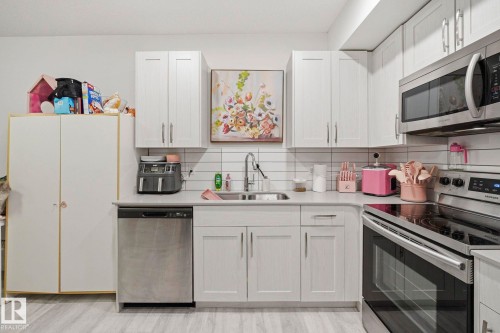 4319 Cooke Lane, Edmonton, AB - Indoor Photo Showing Kitchen With Double Sink
