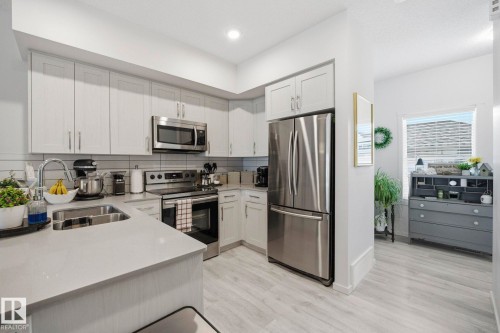 4319 Cooke Lane, Edmonton, AB - Indoor Photo Showing Kitchen With Double Sink