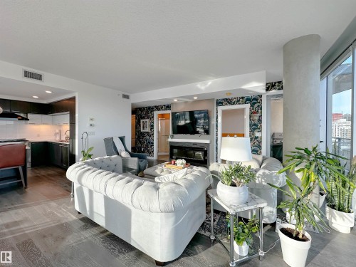 1804 9720 106 Street, Edmonton, AB - Indoor Photo Showing Living Room With Fireplace