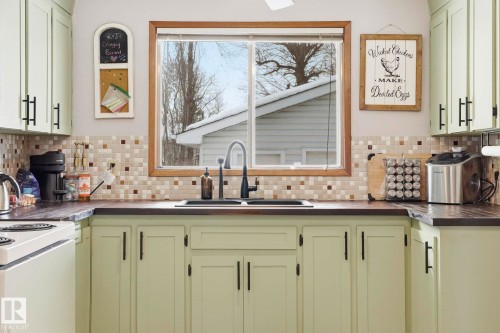 14704 61A Street, Edmonton, AB - Indoor Photo Showing Kitchen With Double Sink