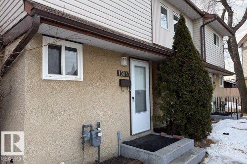 Doorway to property featuring stucco siding - 13833 24 Street, Edmonton, AB - Outdoor With Exterior