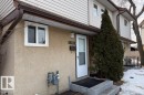 Doorway to property featuring stucco siding - 13833 24 Street, Edmonton, AB  - Outdoor With Exterior 