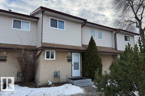 View of front of home featuring a shingled roof - 13833 24 Street, Edmonton, AB - Outdoor