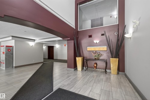 Common area featuring a high ceiling - 427 13005 140 Avenue, Edmonton, AB - Indoor Photo Showing Other Room