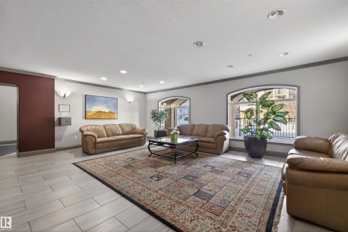 427 13005 140 Avenue, Edmonton, AB - Indoor Photo Showing Living Room