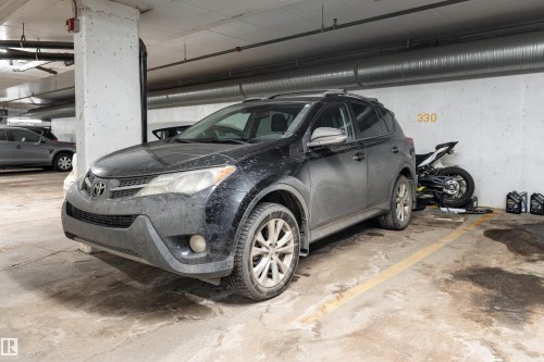 View of parking deck - 325 1520 Hammond Gate, Edmonton, AB - Indoor Photo Showing Garage