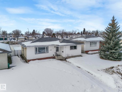 Snow covered property featuring a residential view - 14924 81 Street, Edmonton, AB 