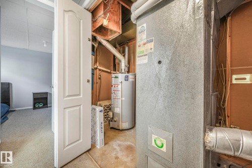 Utility room with water heater and heating unit - 14924 81 Street, Edmonton, AB 