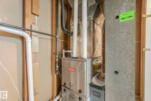 Utility room featuring heating unit - 14924 81 Street, Edmonton, AB 