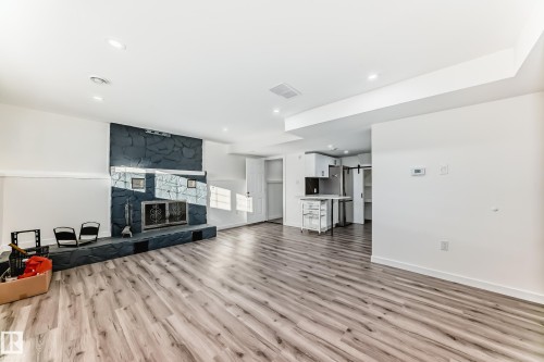 3426 135A Avenue, Edmonton, AB - Indoor Photo Showing Other Room With Fireplace