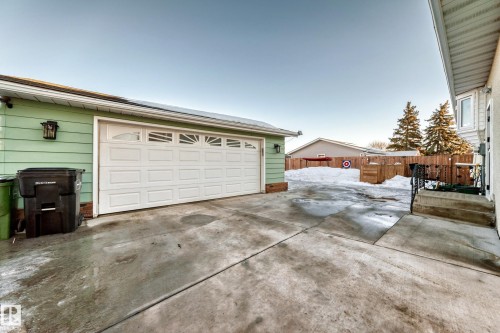 New Concrete Leading To Garage. - 3426 135A Avenue, Edmonton, AB - Outdoor With Exterior
