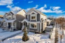View of front of property with a porch - 7613 16 Av Sw, Edmonton, AB  - Outdoor With Facade 
