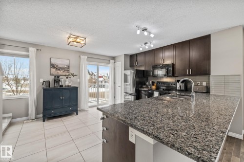 18 1140 Chappelle Boulevard, Edmonton, AB - Indoor Photo Showing Kitchen With Double Sink With Upgraded Kitchen