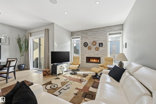 4605 Knight Point(E), Edmonton, AB - Indoor Photo Showing Living Room With Fireplace