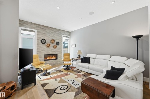 4605 Knight Point(E), Edmonton, AB - Indoor Photo Showing Living Room With Fireplace