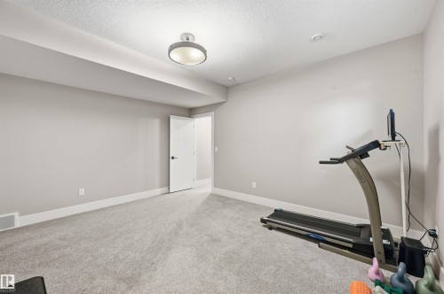 4605 Knight Point(E), Edmonton, AB - Indoor Photo Showing Gym Room