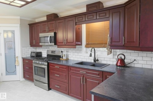 5226 43 Street, Barrhead, AB - Indoor Photo Showing Kitchen With Double Sink