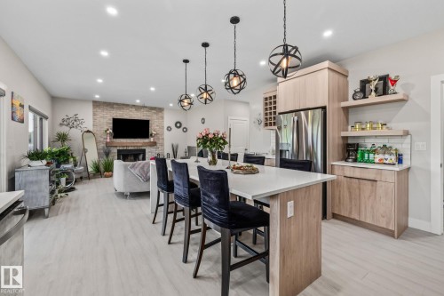 5225 55 55St, Wabamun, AB - Indoor Photo Showing Dining Room With Fireplace