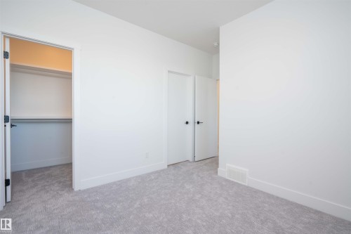 165 Edgewater Cir, Leduc, AB - Indoor Photo Showing Other Room